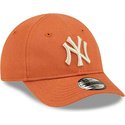 new-era-curved-brim-toddler-9forty-league-essential-new-york-yankees-mlb-orange-adjustable-cap-with-beige-logo