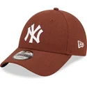 verstellbare-braune-9forty-leinen-kappe-mit-gebogenem-schirm-der-new-york-yankees-mlb-von-new-era