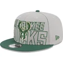 graue-und-grune-flatcap-snapback-9fifty-draft-edition-2023-der-milwaukee-bucks-nba-von-new-era