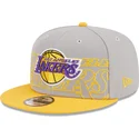 graue-und-gelbe-snapback-kappe-9fifty-draft-edition-2023-der-los-angeles-lakers-nba-von-new-era