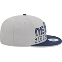 graue-und-marineblaue-snapback-flachkappe-9fifty-draft-edition-2023-der-memphis-grizzlies-nba-von-new-era