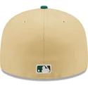 flache-beige-und-grune-anliegende-kappe-59fifty-the-elements-earth-pin-der-new-york-yankees-mlb-von-new-era