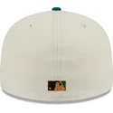 graue-und-grune-flat-brim-cap-mit-braunem-logo-59fifty-camp-der-new-york-yankees-mlb-von-new-era