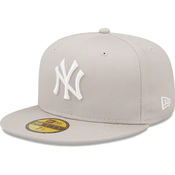 beige-angepasste-59fifty-league-essential-flat-cap-der-new-york-yankees-mlb-von-new-era