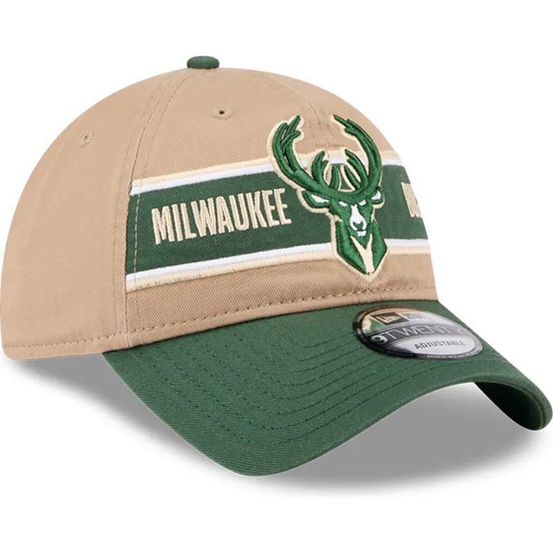 justerbar-brun-och-gron-kurvskarmkeps-9twenty-draft-2024-milwaukee-bucks-nba-fran-new-era