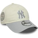 beige-graue-verstellbare-damen-cap-9twenty-world-series-cooperstown-der-new-york-yankees-mlb-von-new-era