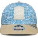blaue-und-beige-gebogene-kappe-snapback-9seventy-stretch-snap-lifestyle-von-racing-bulls-f1-team-formula-1-von-new-era