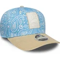 blaue-und-beige-gebogene-kappe-snapback-9seventy-stretch-snap-lifestyle-von-racing-bulls-f1-team-formula-1-von-new-era