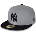 graue-und-marineblaue-anliegende-flatcap-59fifty-world-series-2000-side-patch-der-new-york-yankees-mlb-von-new-era