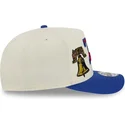 beige-och-bla-snapbackkeps-med-bojd-skarm-9fifty-a-frame-precurved-hardwood-classics-philadelphia-76ers-nba-fran-new-era