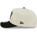 beige-und-schwarze-gebogene-snapback-kappe-9fifty-a-frame-precurved-hardwood-classics-der-vancouver-grizzlies-nba-von-new-era