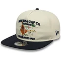 gorra-plana-beige-y-azul-marino-ajustable-19twenty-outdoor-graphic-de-new-era