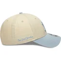 cepice-zaoblena-bezova-snapback-9forty-m-crown-side-script-new-york-yankees-mlb-new-era